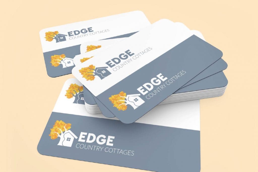 A set of business cards with the word edge on them.