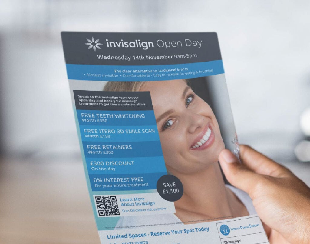 A hand holding an invisalign open day promotional flyer with event details and special offers.