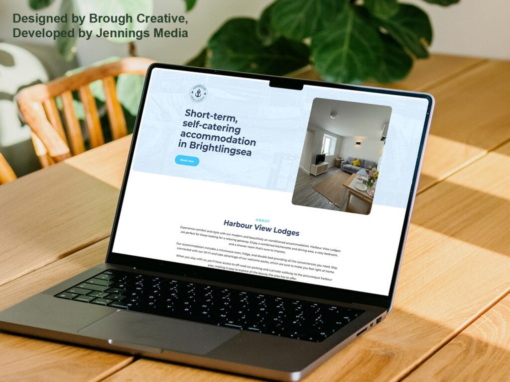 Website design screenshot in a laptop